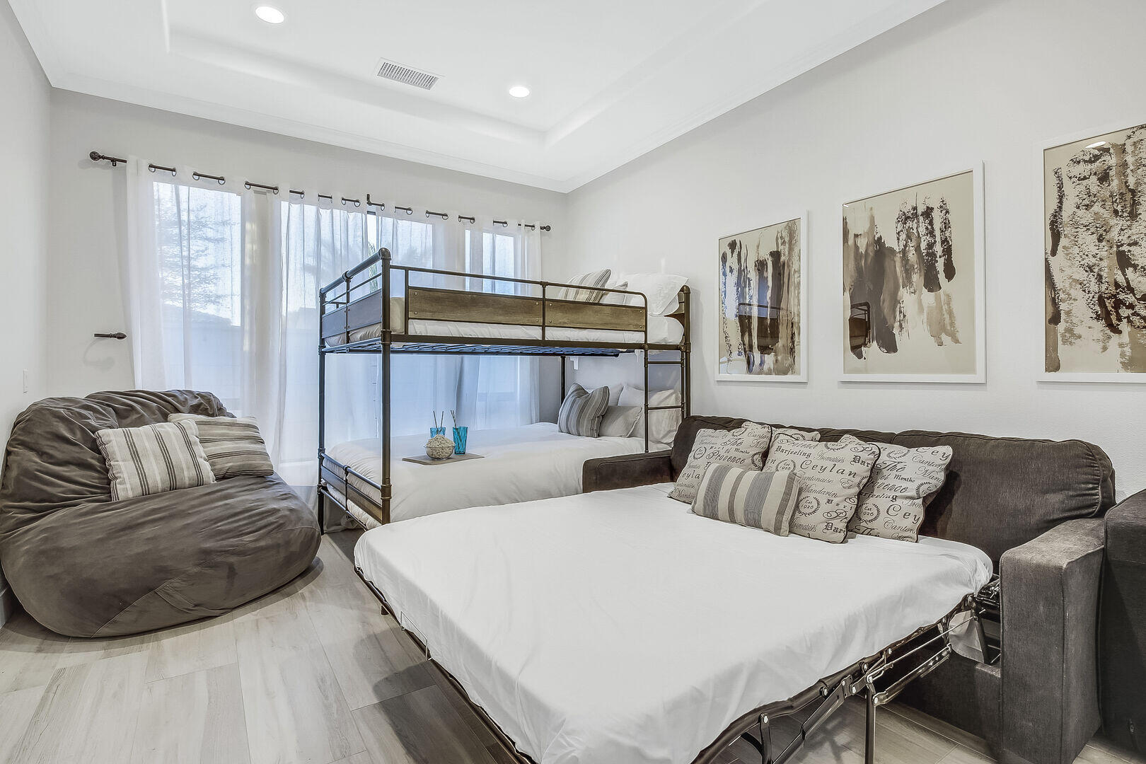 48573 Cascade Street Indio, CA 92201 - Photo 28 of 40 a bedroom with a bed and wooden floor