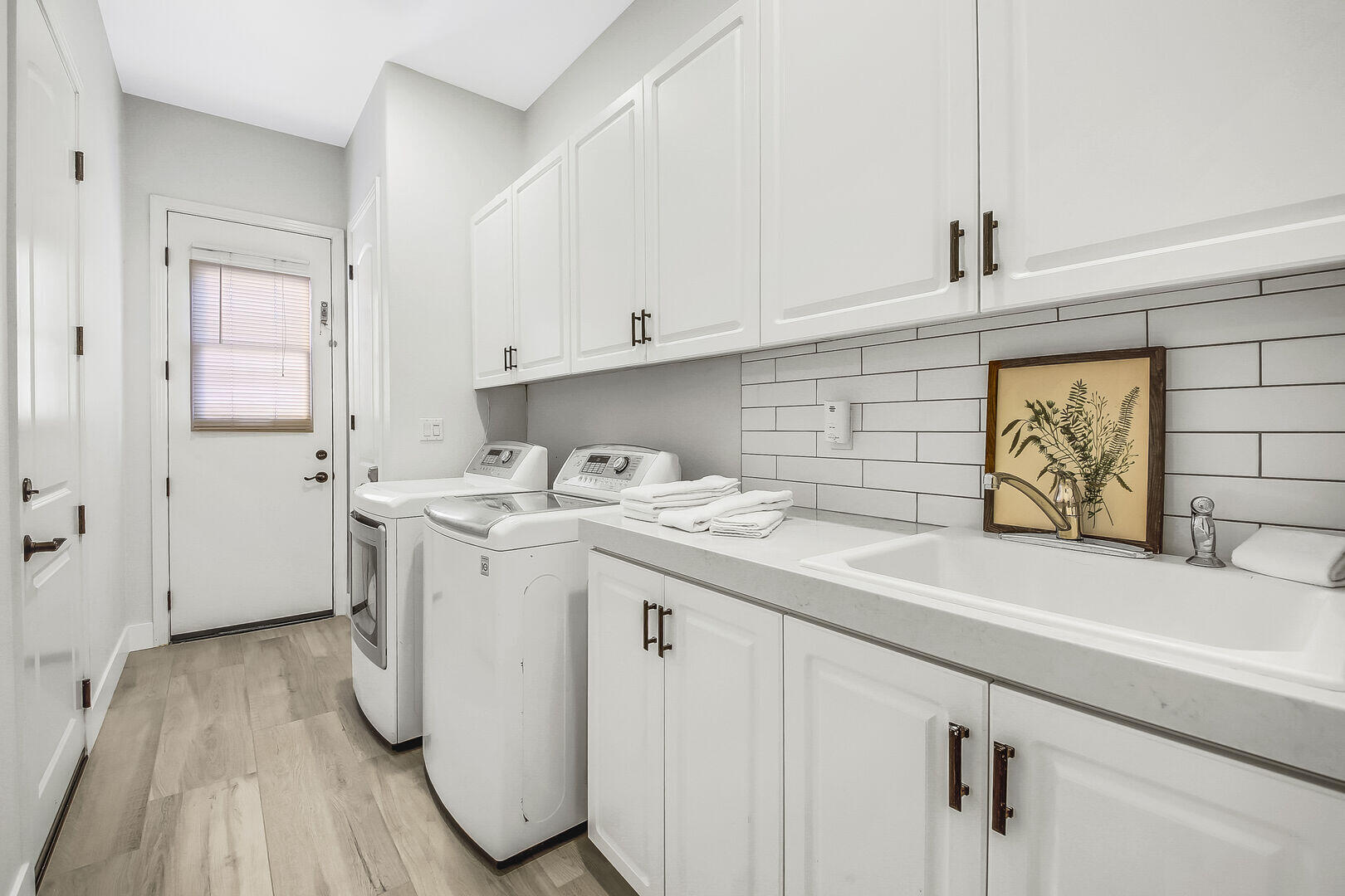 48573 Cascade Street Indio, CA 92201 - Photo 33 of 40 a view of a kitchen with sink and cabinets