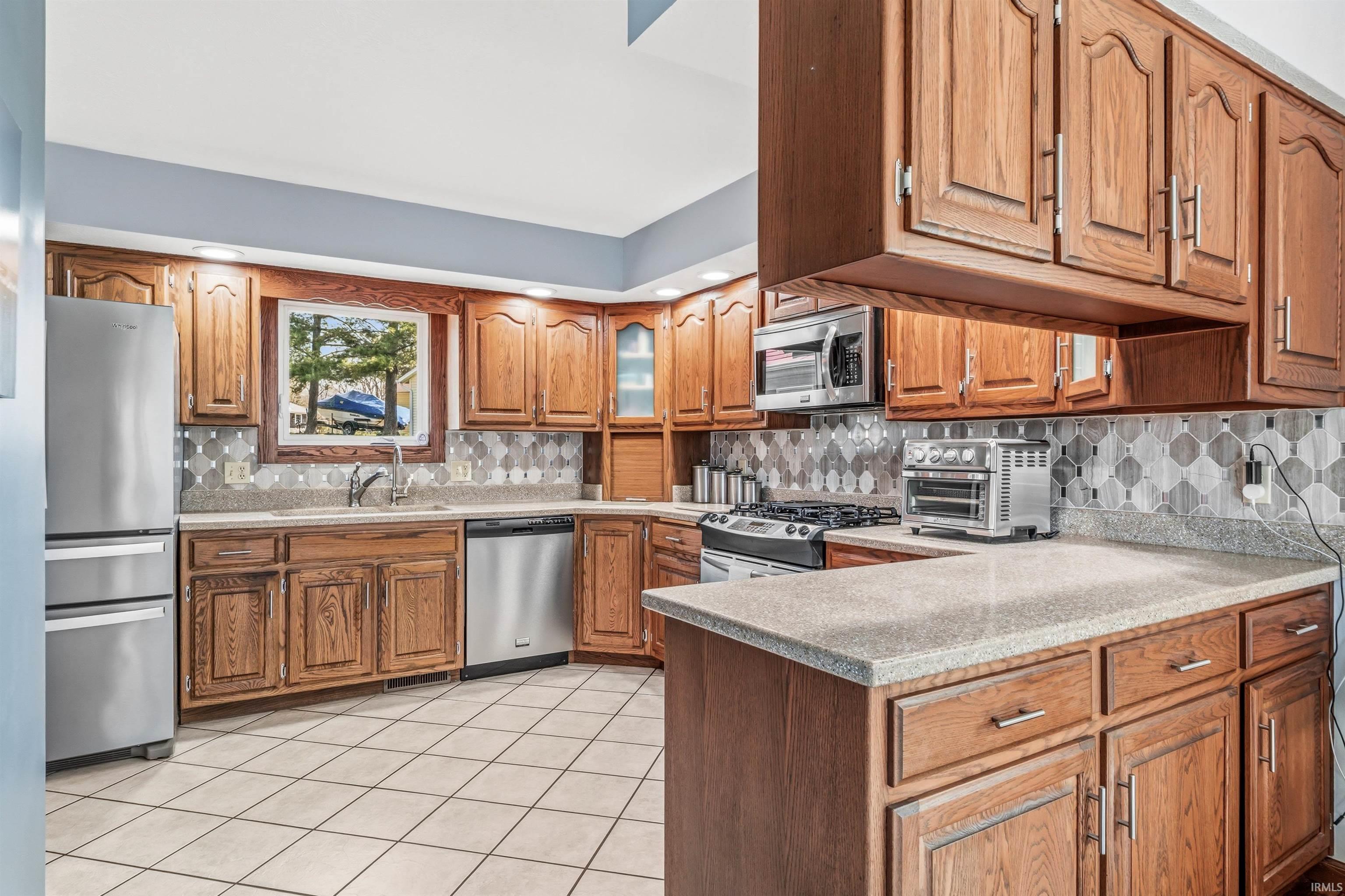 710 Spring Beach Road Rome City, IN 46784 - Photo 7 of 26