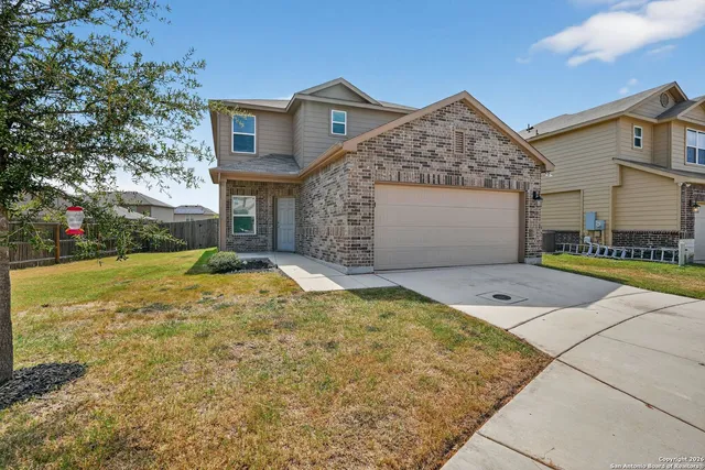 a front view of house with yard