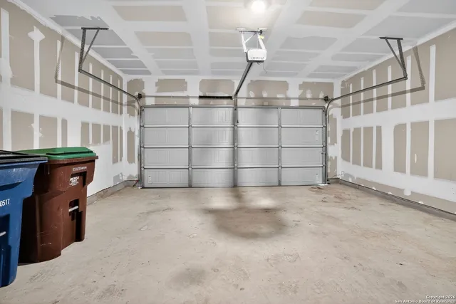 a view of a house with wooden wall and a large window