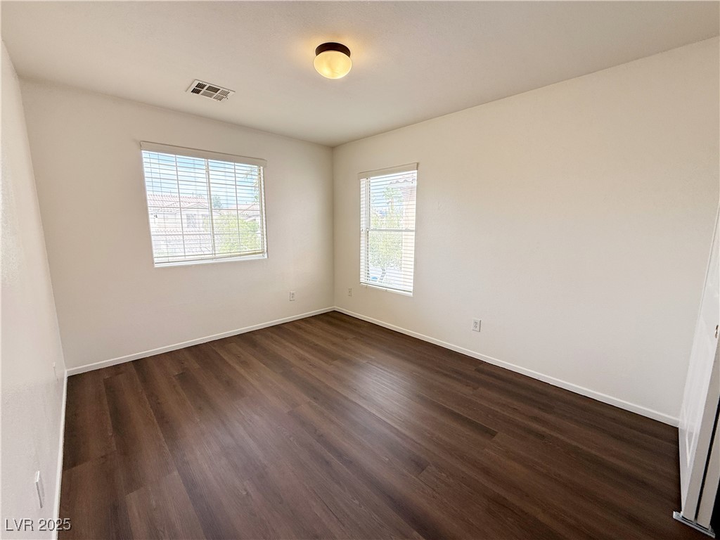 6228 Mercer Valley Street North Las Vegas, NV 89081 - Photo 23 of 41 Spare room with dark wood finished floors