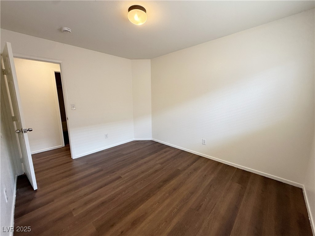 6228 Mercer Valley Street North Las Vegas, NV 89081 - Photo 29 of 41 Empty room featuring dark wood-style floors