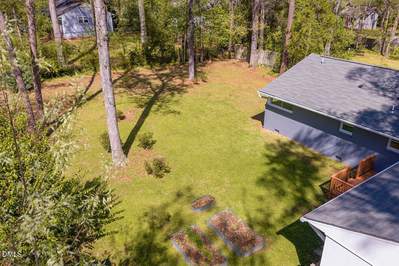 231 Flemington Road Chapel Hill, NC 27517 - Photo 37 of 48 a view of a yard with plants