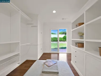 a bathroom with a granite countertop shower