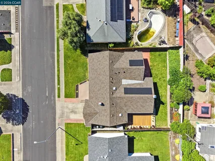 an aerial view of residential building with an outdoor space