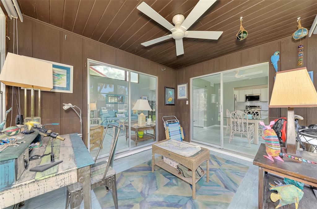 2985 North Beach Road, Unit C53 Englewood, FL 34223 - Photo 25 of 67 a living room filled with furniture