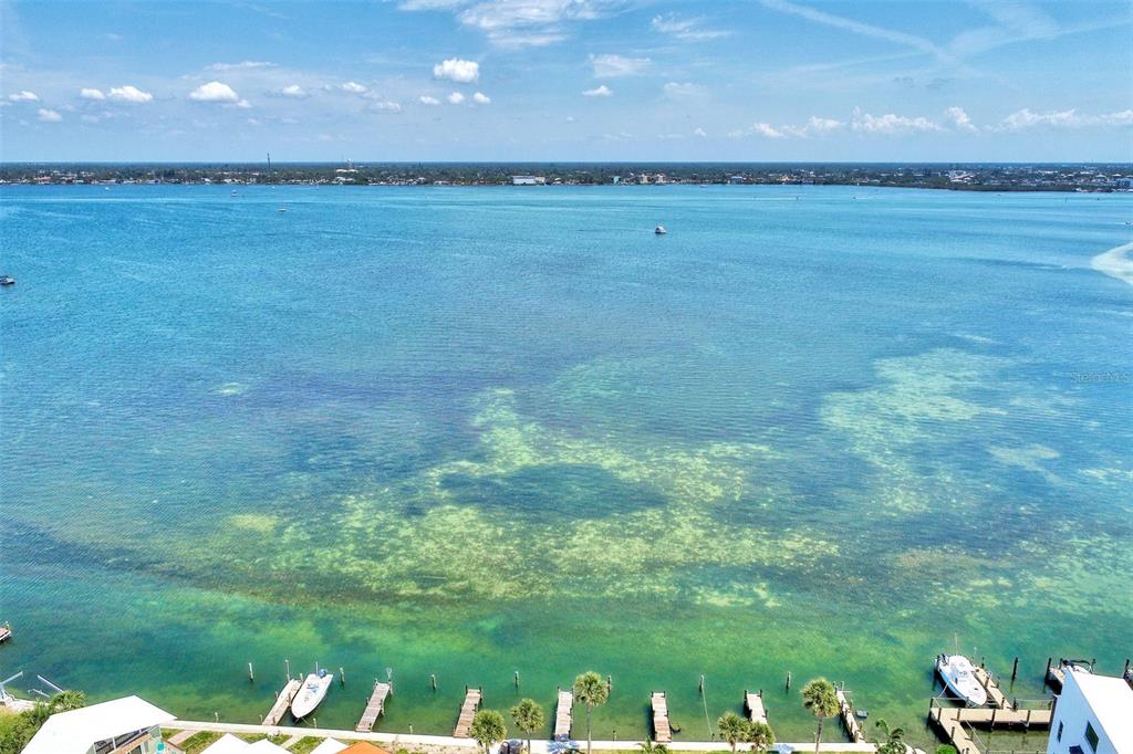 2985 North Beach Road, Unit C53 Englewood, FL 34223 - Photo 46 of 67 a view of a big yard