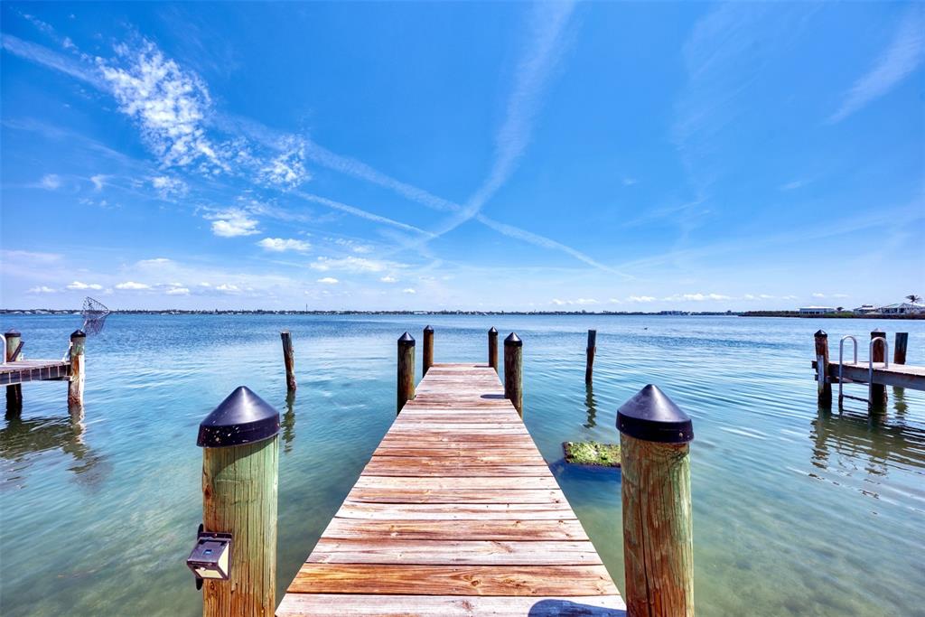 2985 North Beach Road, Unit C53 Englewood, FL 34223 - Photo 58 of 67 a view of a balcony with chairs