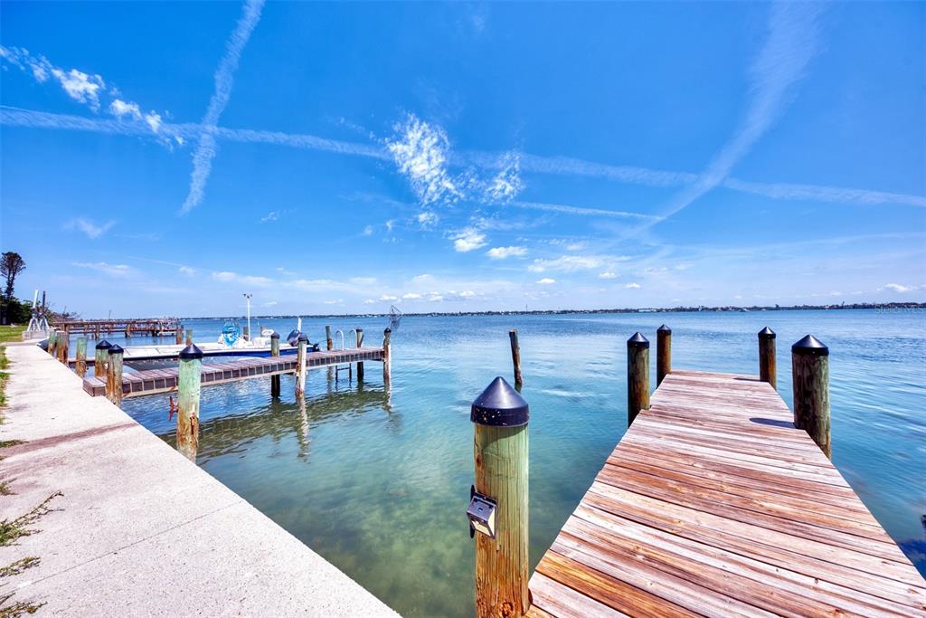 2985 North Beach Road, Unit C53 Englewood, FL 34223 - Photo 59 of 67 a view of a terrace with sitting area