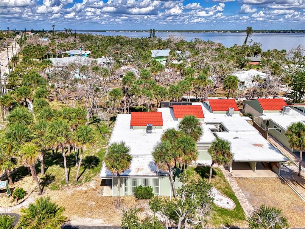 2985 North Beach Road, Unit C53 Englewood, FL 34223 - Photo 61 of 67 an aerial view of residential houses with outdoor space and street view