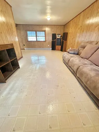 a view of an empty room with windows