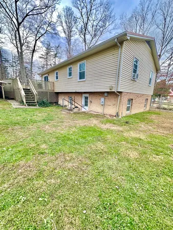 a view of a park with iron fence