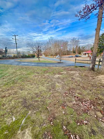a front view of a house with parking