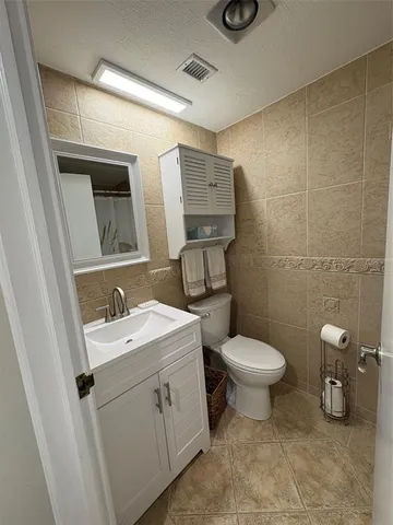 a bathroom with a shower and a bathtub