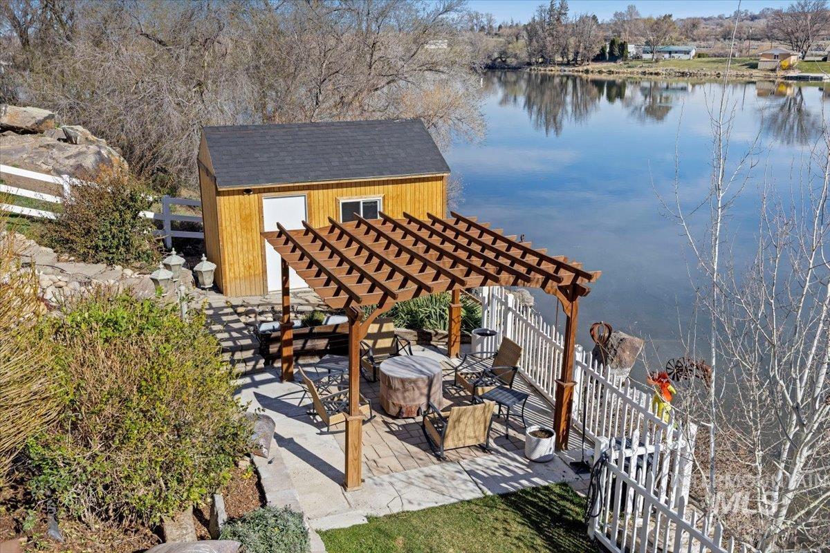 40 Bell Rapids Road Hagerman, ID 83332 - Photo 38 of 50 View of patio featuring a water view and a pergola