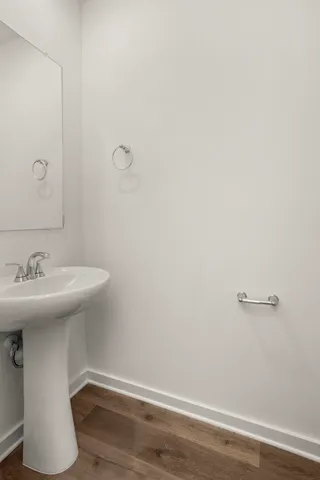 a bathroom with a sink and vanity