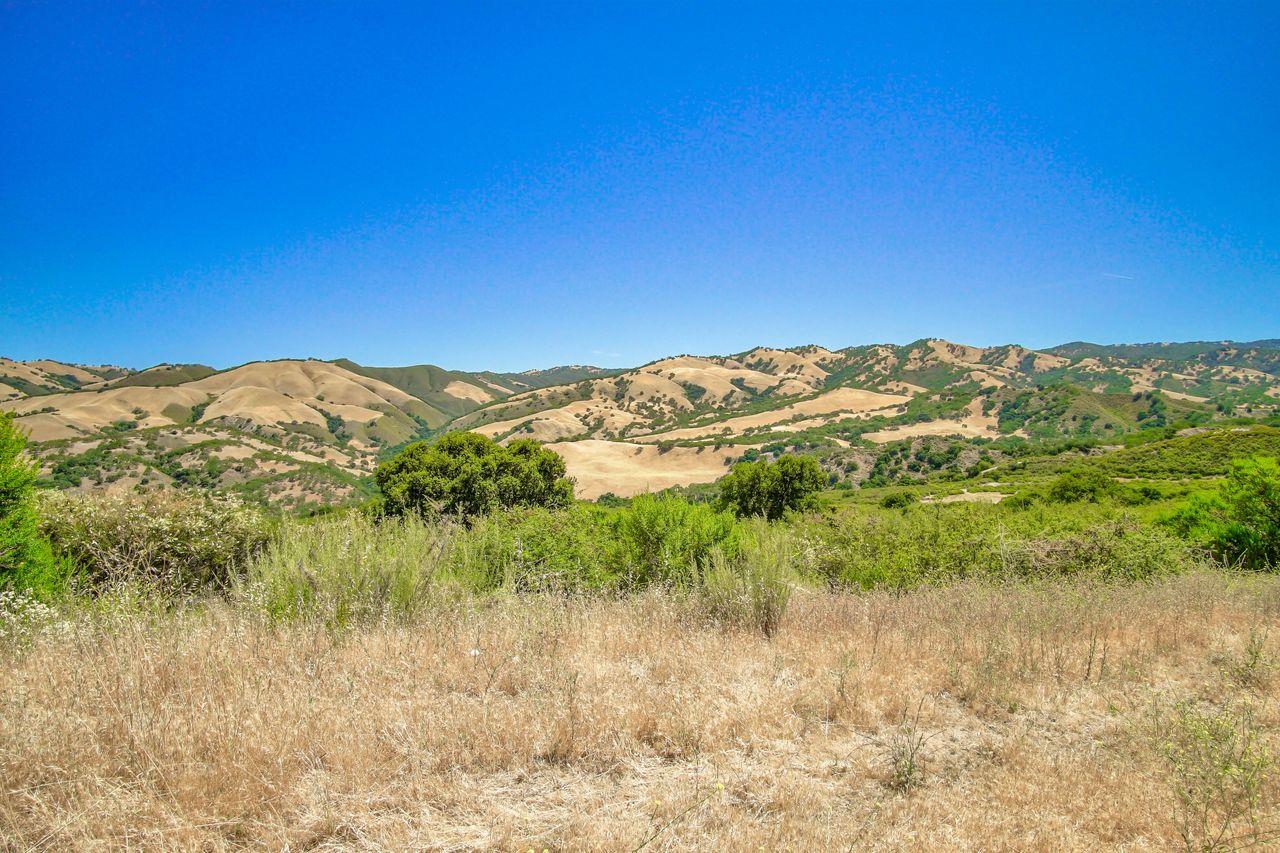 36000 East Carmel Valley Road Carmel Valley, CA 93924 - Photo 11 of 41 a view of a lake with mountains in the background