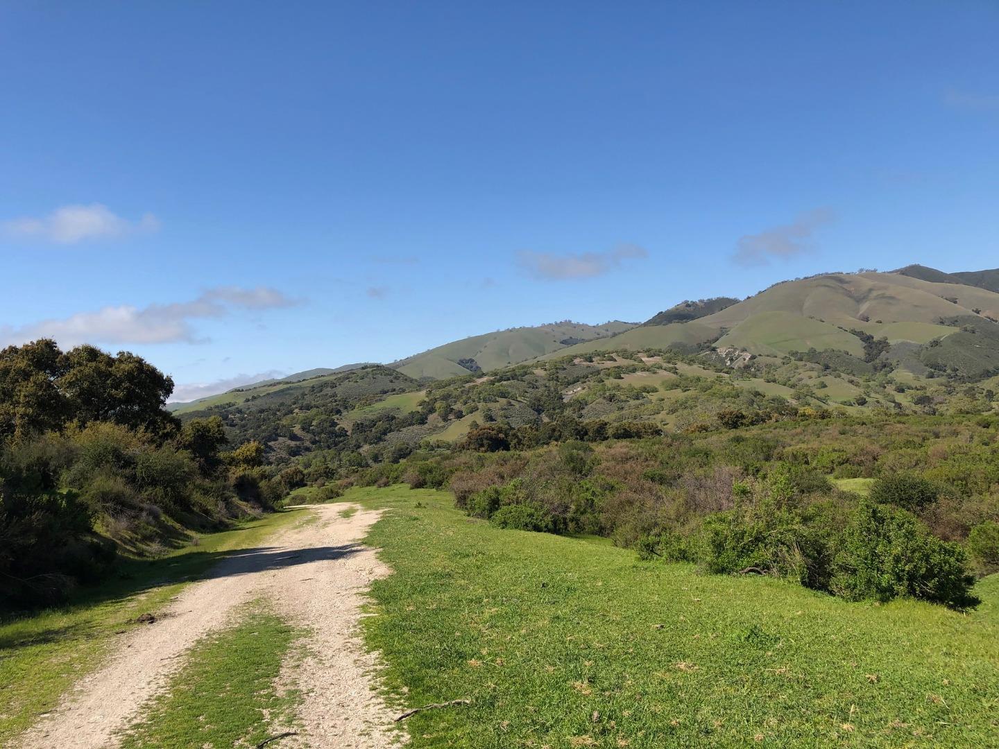 36000 East Carmel Valley Road Carmel Valley, CA 93924 - Photo 32 of 41 a view of a lake with mountains in the background