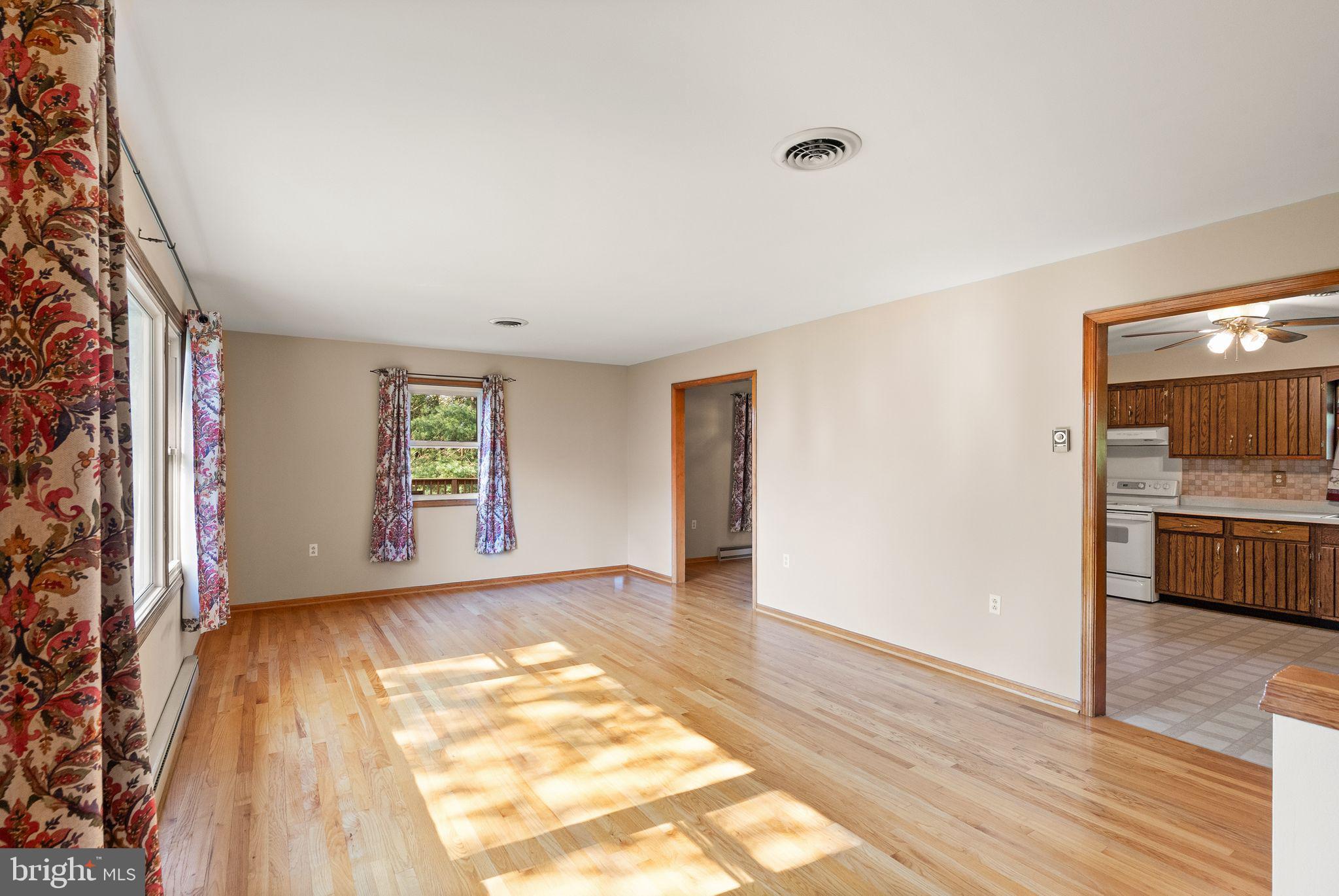 4106 Gene Hemp Road Jefferson, MD 21755 - Photo 17 of 51 Living Room w/Access into Kitchen & Dining Room