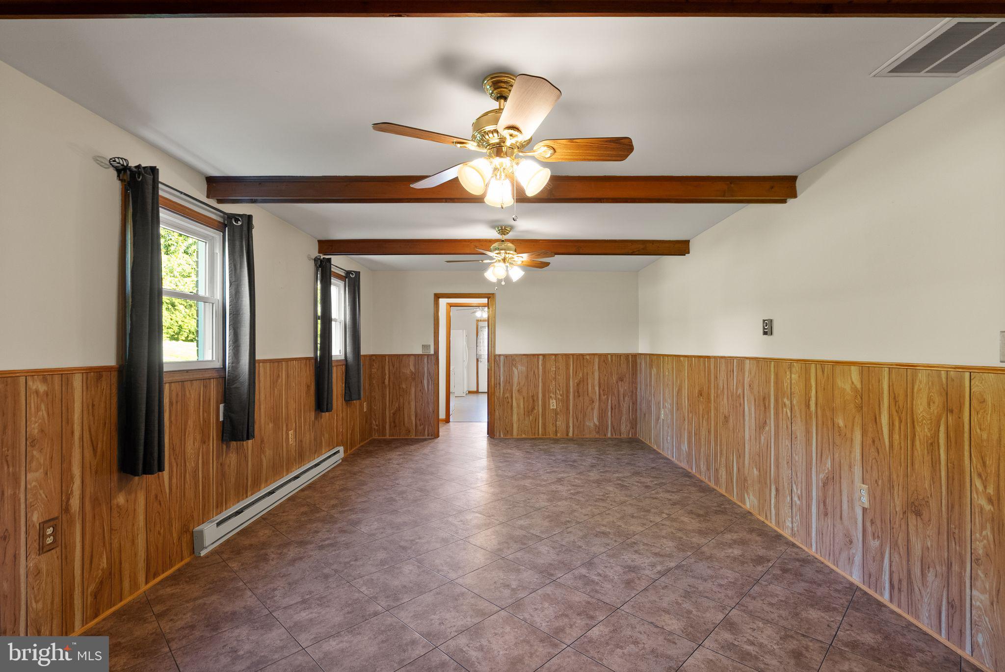 4106 Gene Hemp Road Jefferson, MD 21755 - Photo 31 of 51 Family Room w/Half Bath, Laundry Room Access