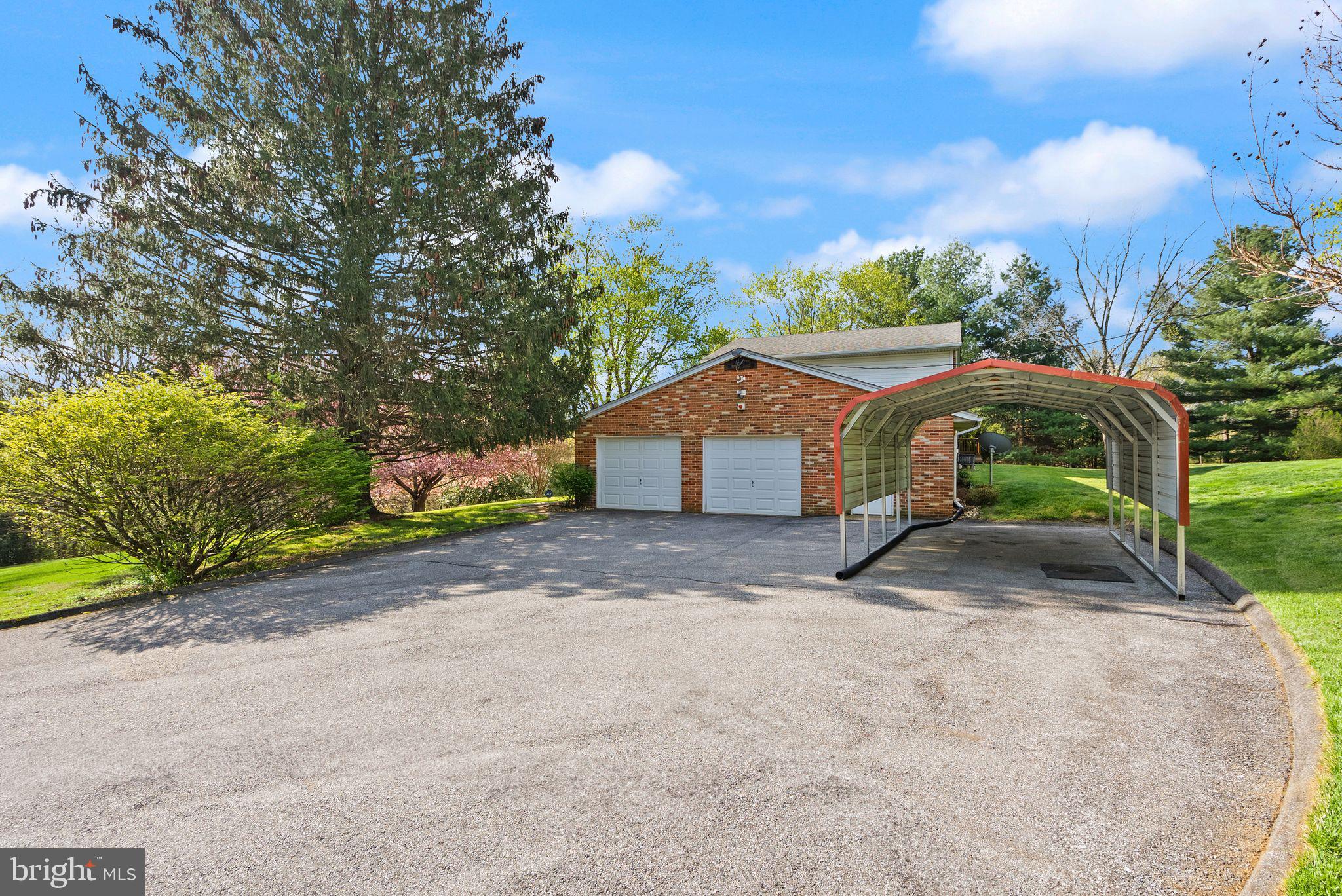 4106 Gene Hemp Road Jefferson, MD 21755 - Photo 44 of 51 2-Car Side-Load Garage and Supplemental Carport