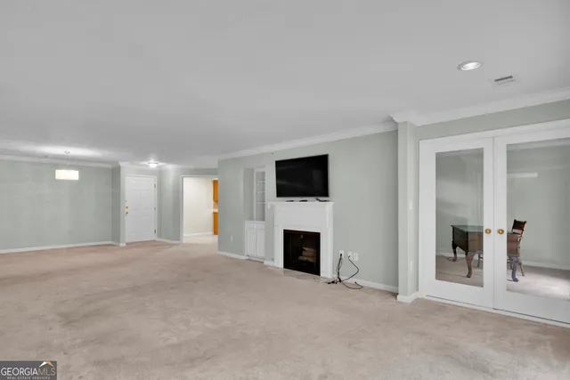 a bedroom with bed and a window