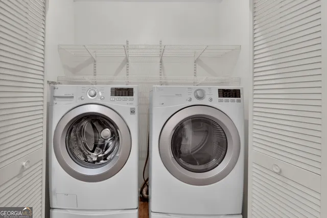 a livingroom with furniture and a fireplace