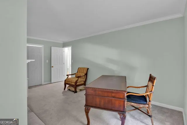 a bathroom with a sink and mirror with bathtub