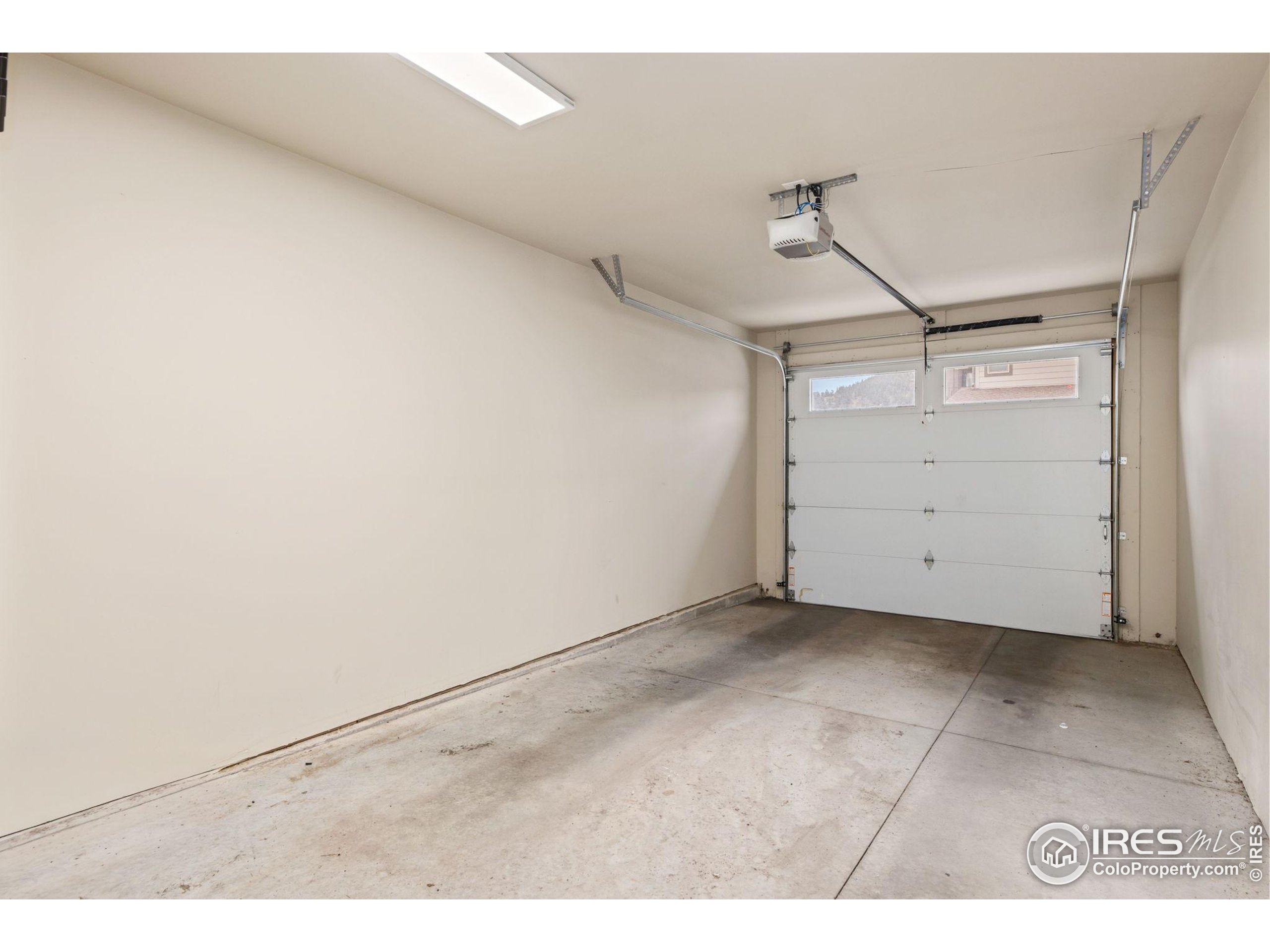 1734 Wildfire Road, Unit 102 Estes Park, CO 80517 - Photo 25 of 33 a view of a garage