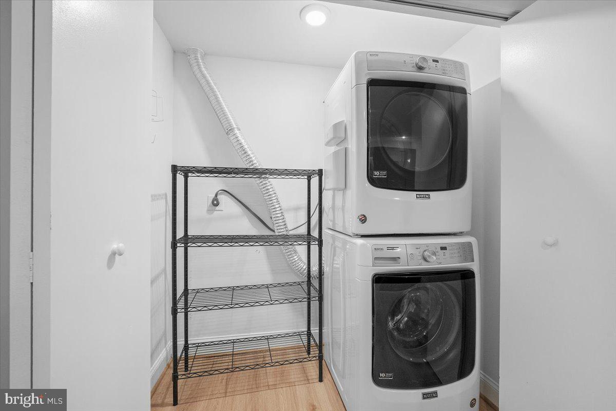 10302 Conover Drive Silver Spring, MD 20902 - Photo 31 of 44 a utility room with dryer and washer