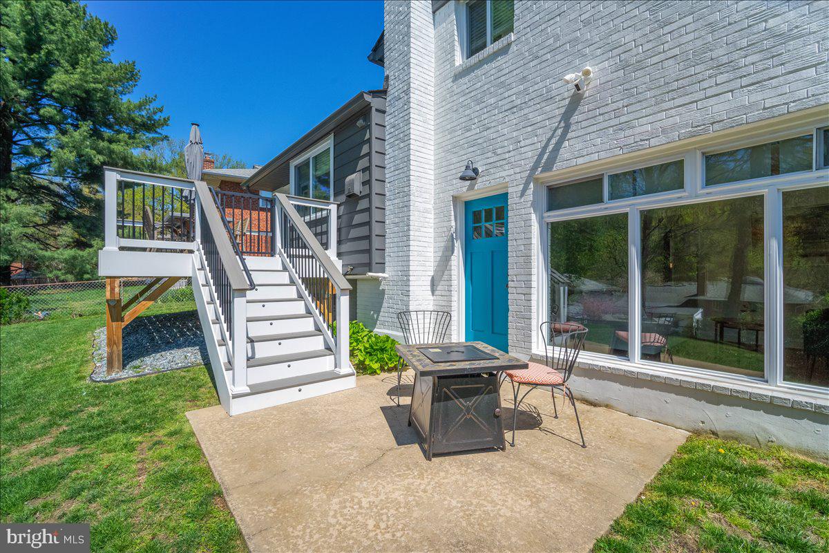 10302 Conover Drive Silver Spring, MD 20902 - Photo 32 of 44 a view of a house with backyard porch and sitting area