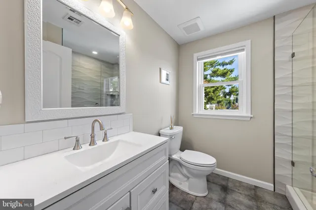 a bedroom with a bed and a table