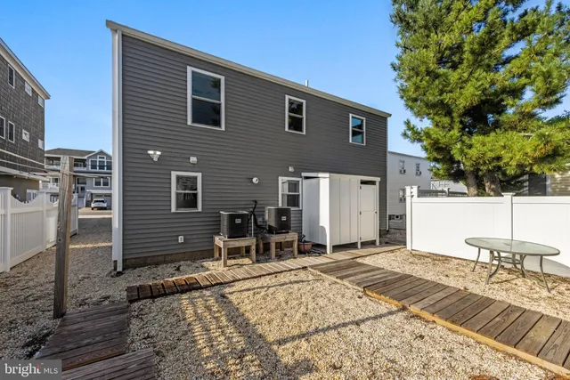 a backyard of a house with seating space