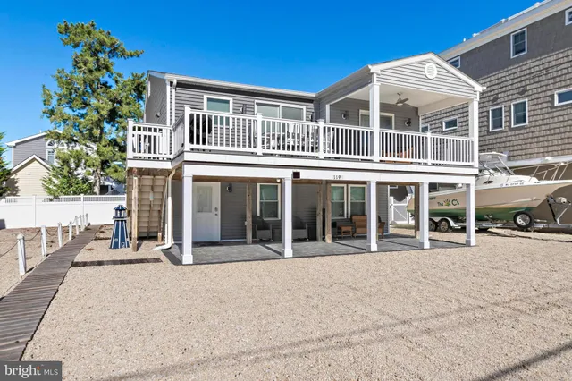 front view of a building with a garden