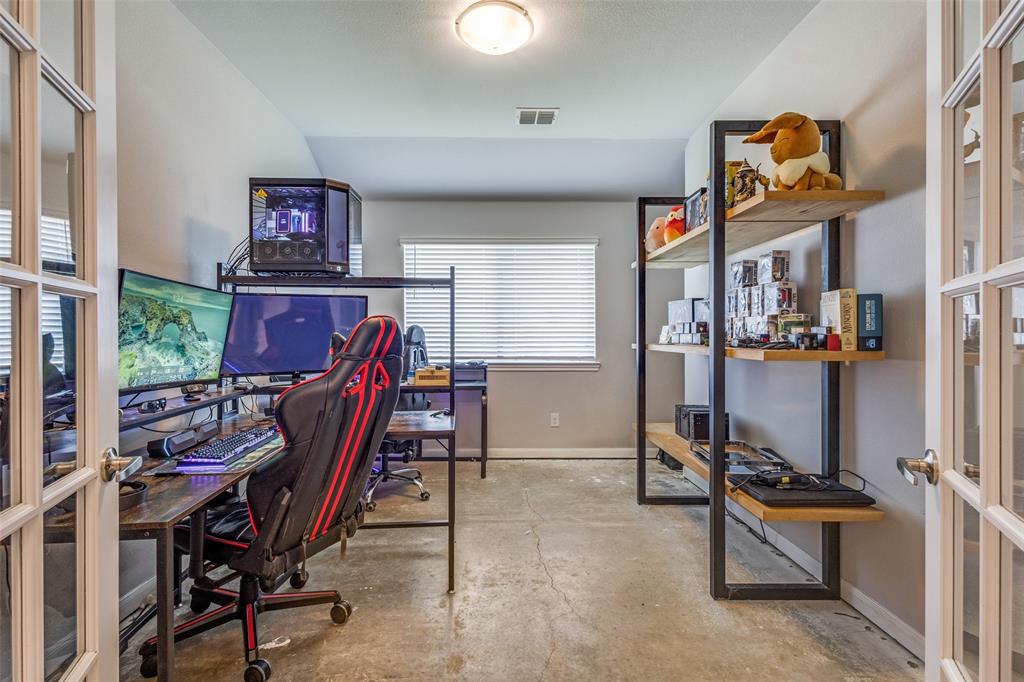 1404 Rosebush Road Aubrey, TX 76227 - Photo 4 of 25 a view of a room with gym equipment