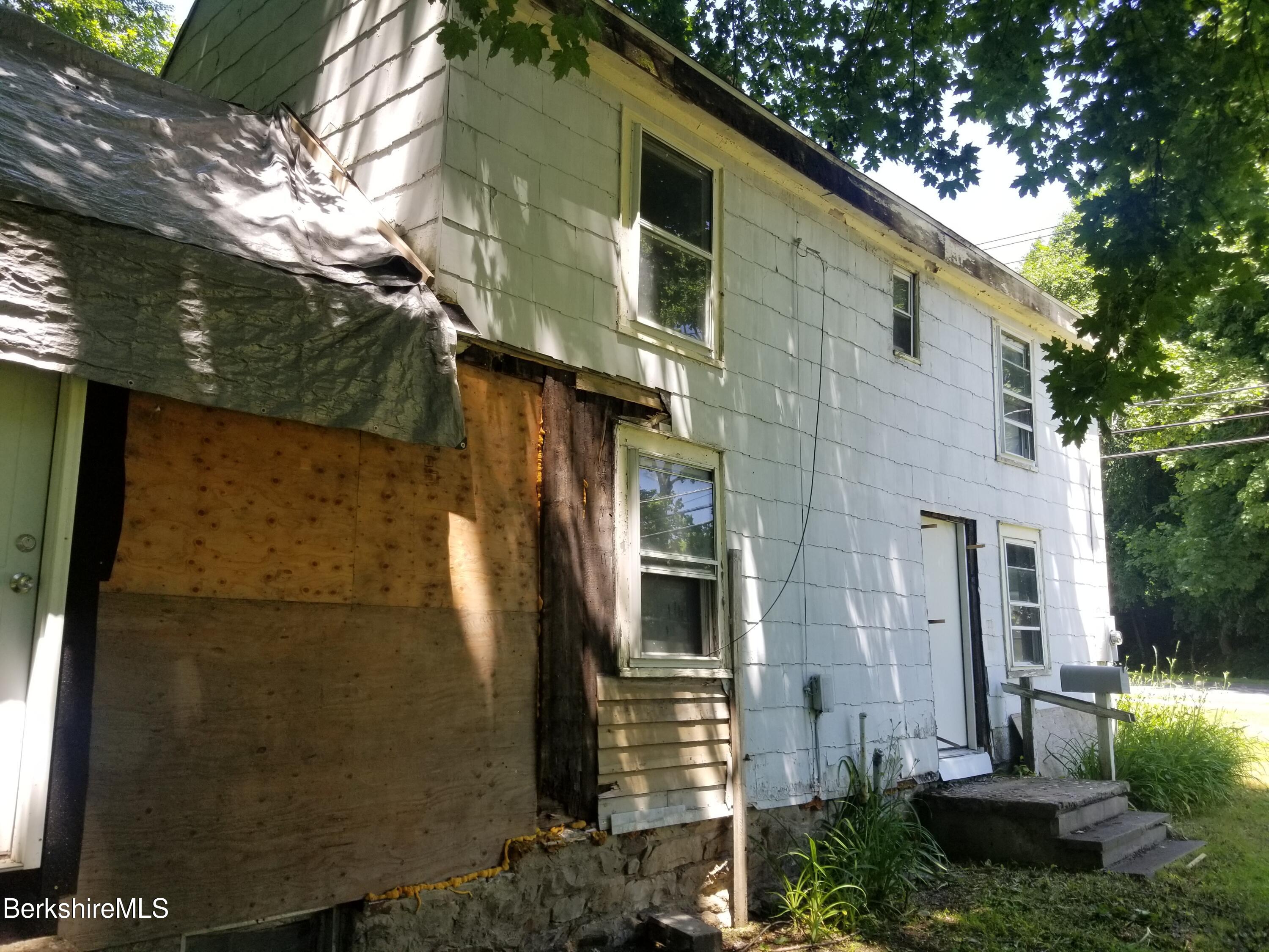 247 Pecks Road Pittsfield, MA 01201 - Photo 5 of 13 a view of a back yard of the house