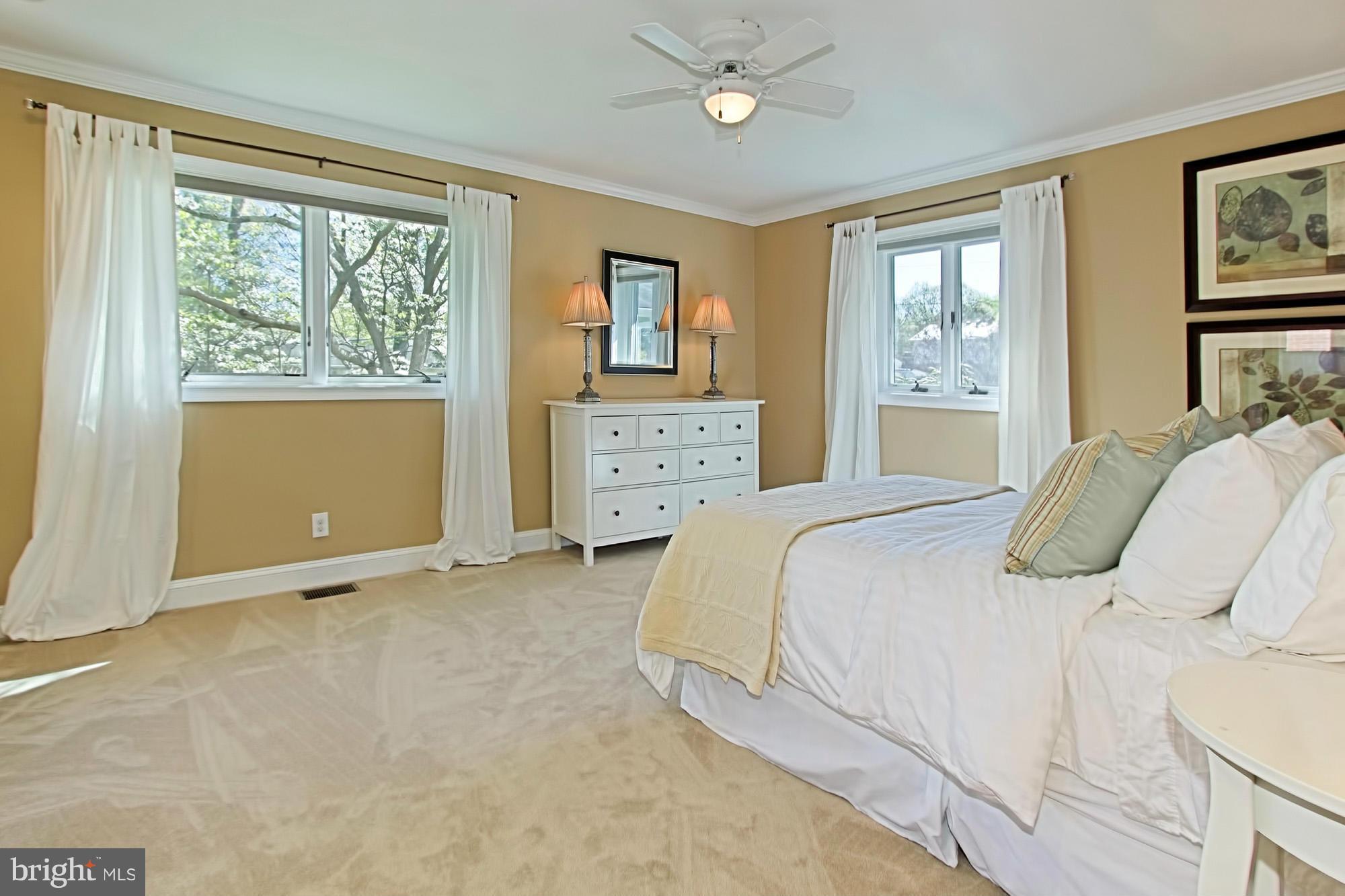 3900 Chesterbrook Road Arlington, VA 22207 - Photo 14 of 30 a bedroom with a bed and a window