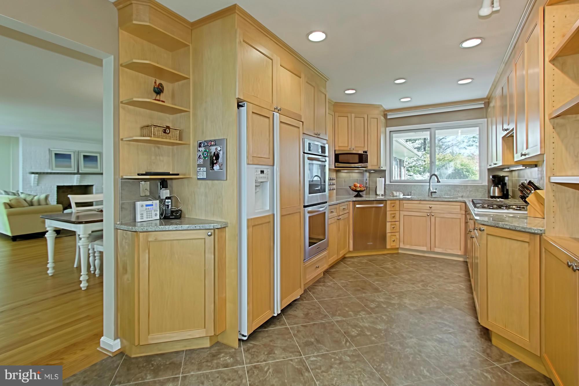 3900 Chesterbrook Road Arlington, VA 22207 - Photo 9 of 30 a kitchen with cabinets and window