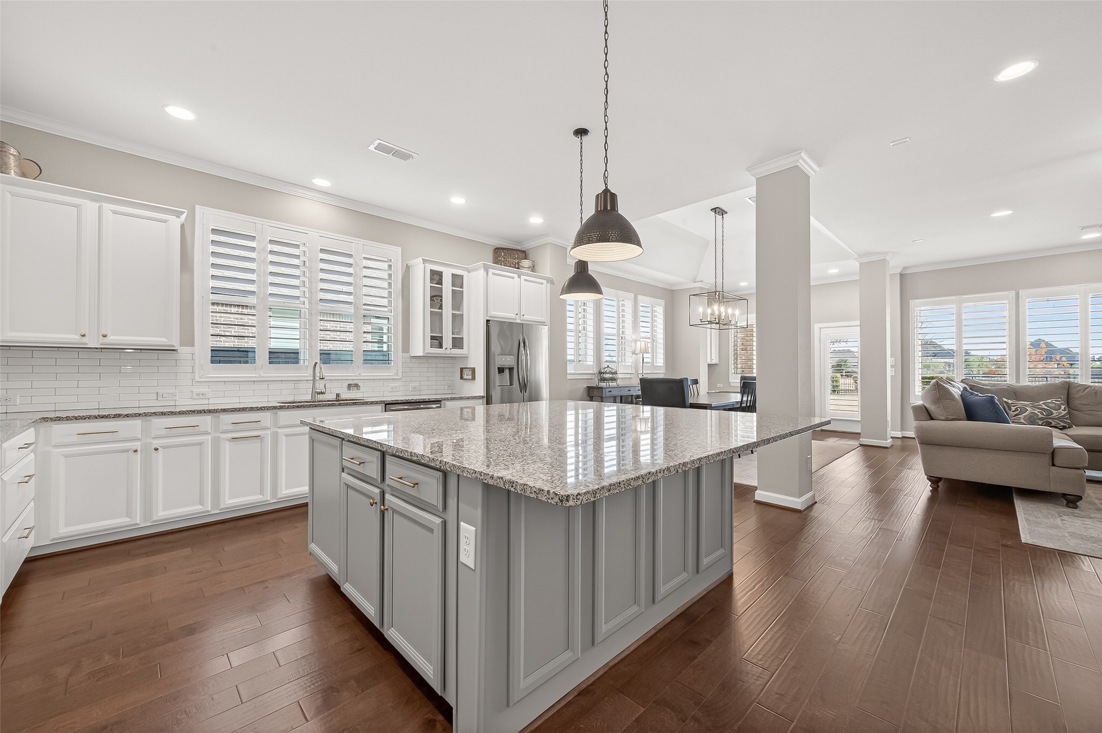 1307 Layla Sage Loop Richmond, TX 77406 - Photo 14 of 50 The heart of the home is the expansive open-concept kitchen, dining, and family room, designed for both everyday living and effortless entertaining.