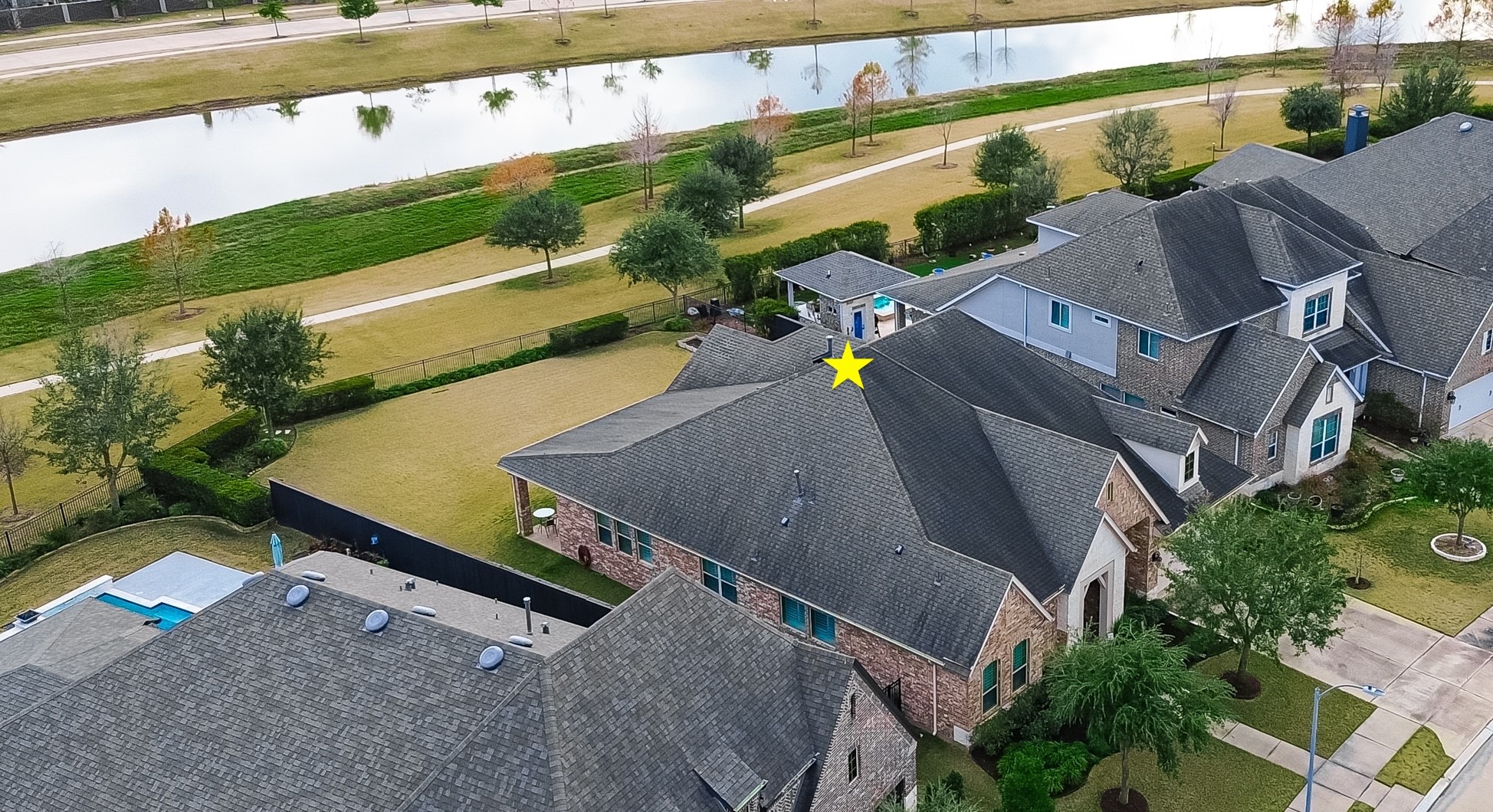 1307 Layla Sage Loop Richmond, TX 77406 - Photo 2 of 50 LAKE VIEWS***The primary focal point of this exceptional home is its breathtaking lake view and direct gated access to a scenic walking path — offering a rare combination of privacy, nature, and lifestyle right in your own backyard.