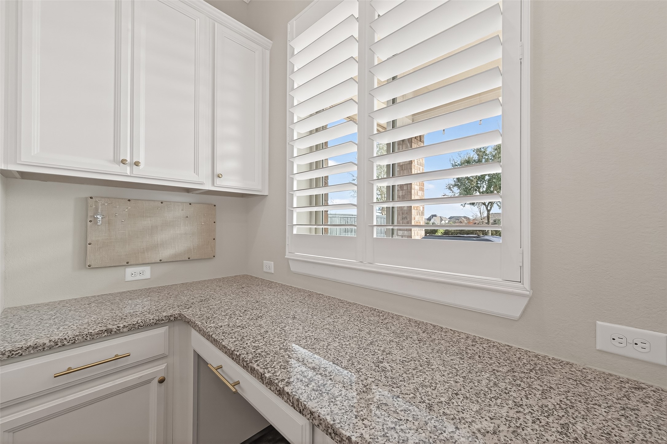 1307 Layla Sage Loop Richmond, TX 77406 - Photo 23 of 50 *Upgrade- a charming built-in desk area, perfect for organization or homework space.