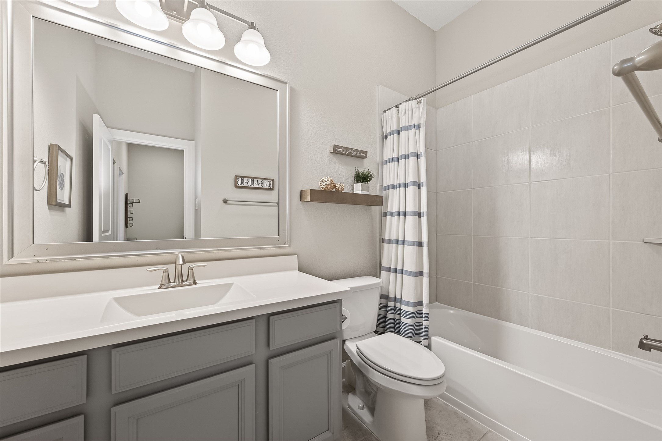 1307 Layla Sage Loop Richmond, TX 77406 - Photo 34 of 50 A full secondary bath with vanity space completes this wing on the home!