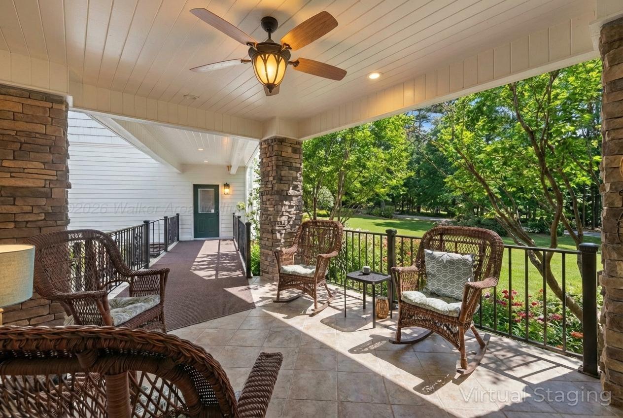 392 Baughn Road Jasper, AL 35503 - Photo 12 of 40 Covered breezeway leading to the 4 car garage and apartment.
