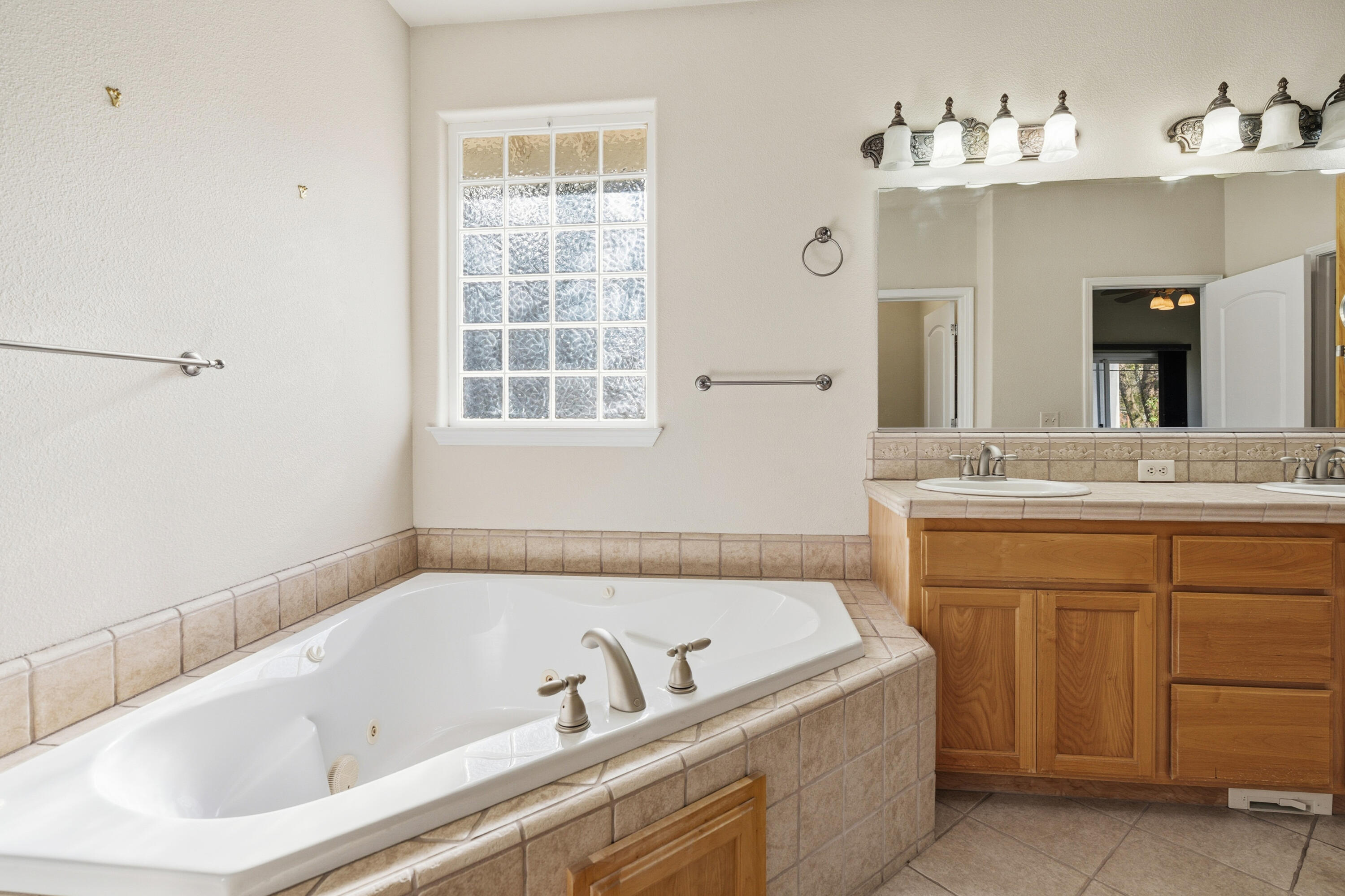 14535 Molluc Drive Red Bluff, CA 96080 - Photo 25 of 72 a bathroom with a bathtub and a sink