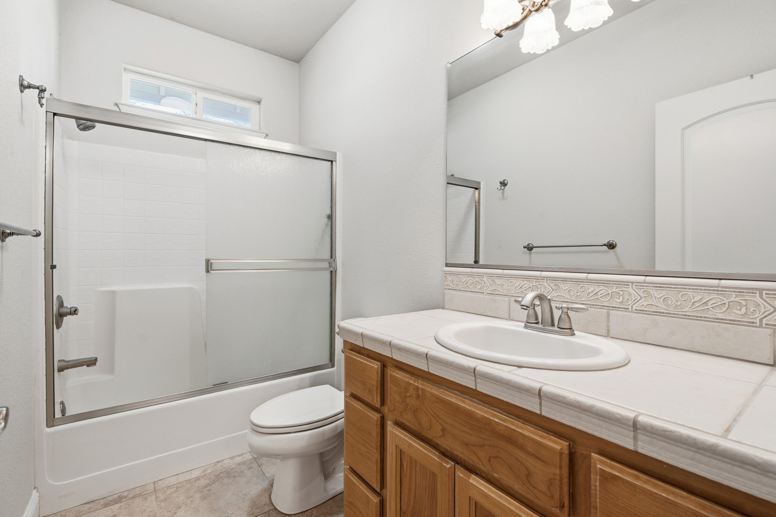 14535 Molluc Drive Red Bluff, CA 96080 - Photo 32 of 72 a bathroom with a sink a toilet and shower