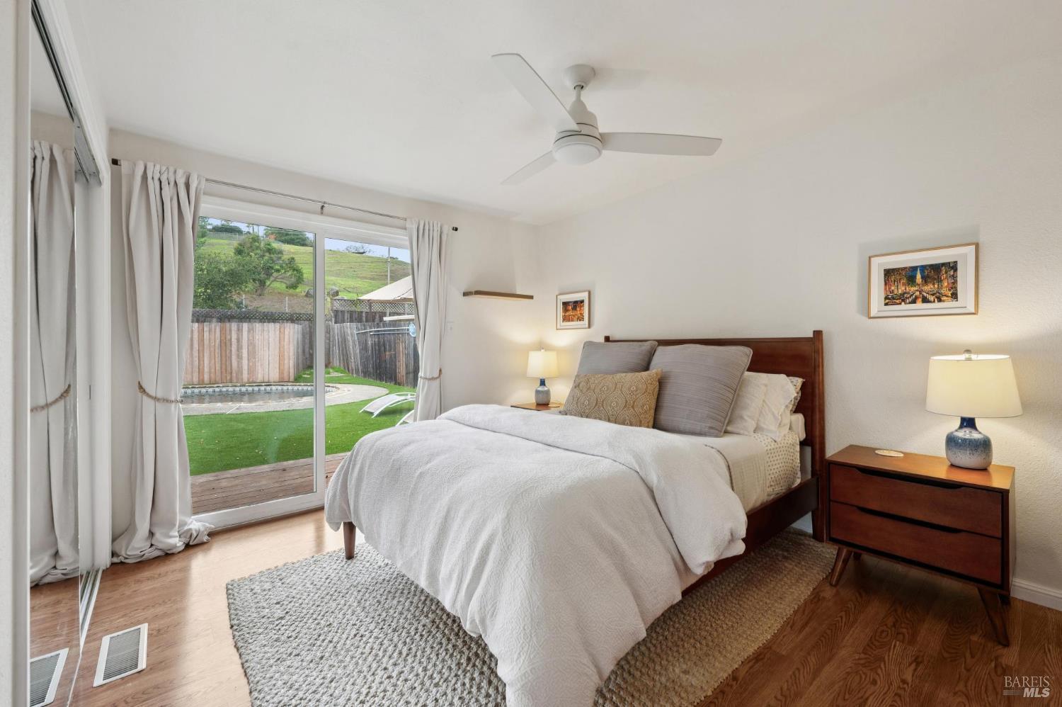 105 Corrillo Drive San Rafael, CA 94903 - Photo 14 of 33 a bed room with a bed and a window