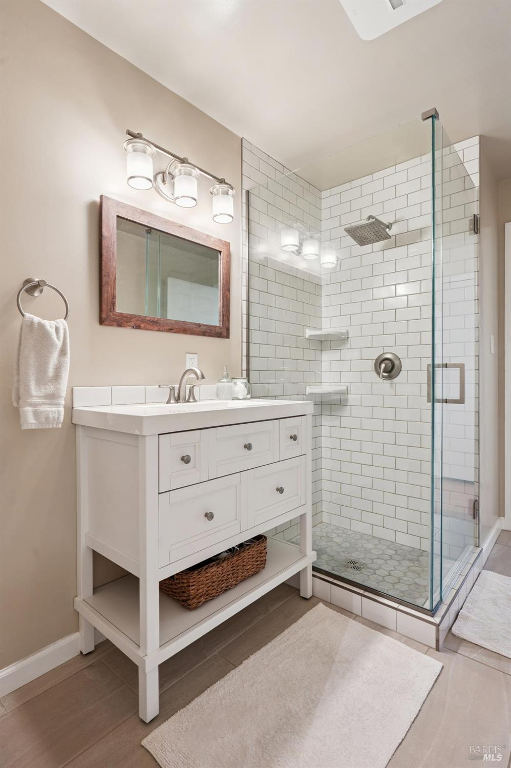 105 Corrillo Drive San Rafael, CA 94903 - Photo 17 of 33 a bathroom with a double vanity sink mirror and double
