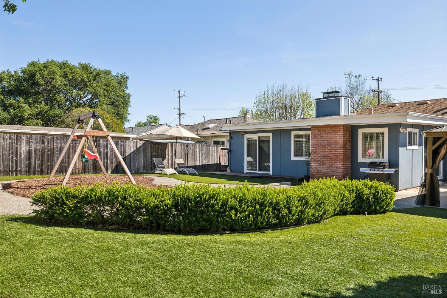 105 Corrillo Drive San Rafael, CA 94903 - Photo 25 of 33 a front view of a house with garden