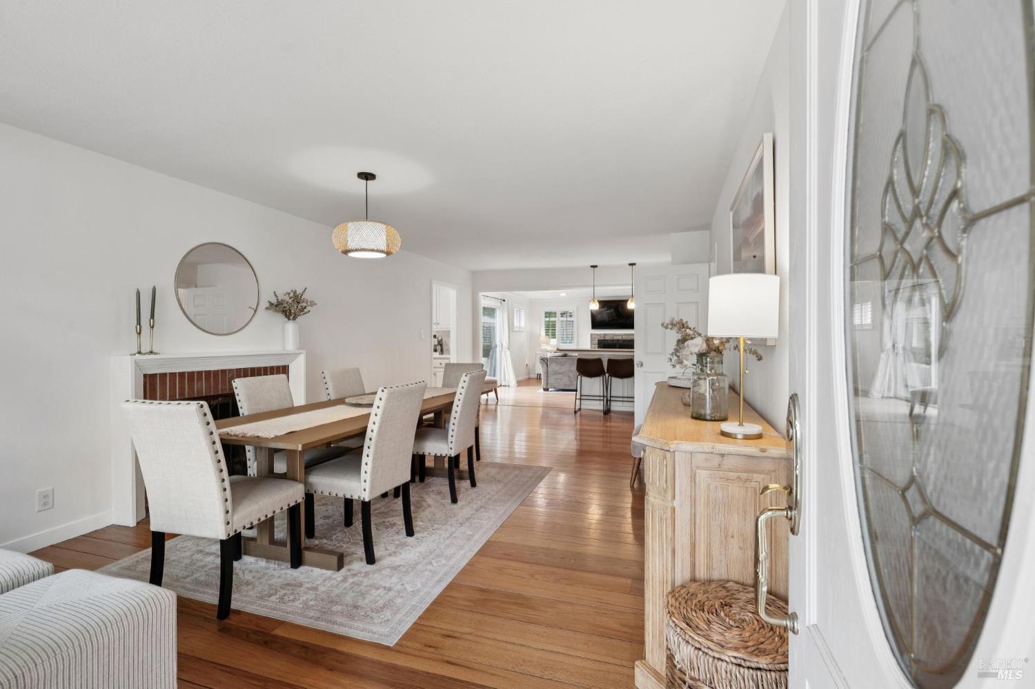 105 Corrillo Drive San Rafael, CA 94903 - Photo 3 of 33 a view of a dining room with furniture and wooden floor